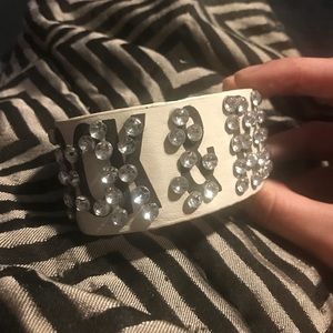 Custom bracelet with rime-stones.